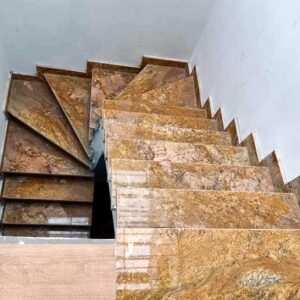 Ốp đá cầu thang nhà 4 tầng